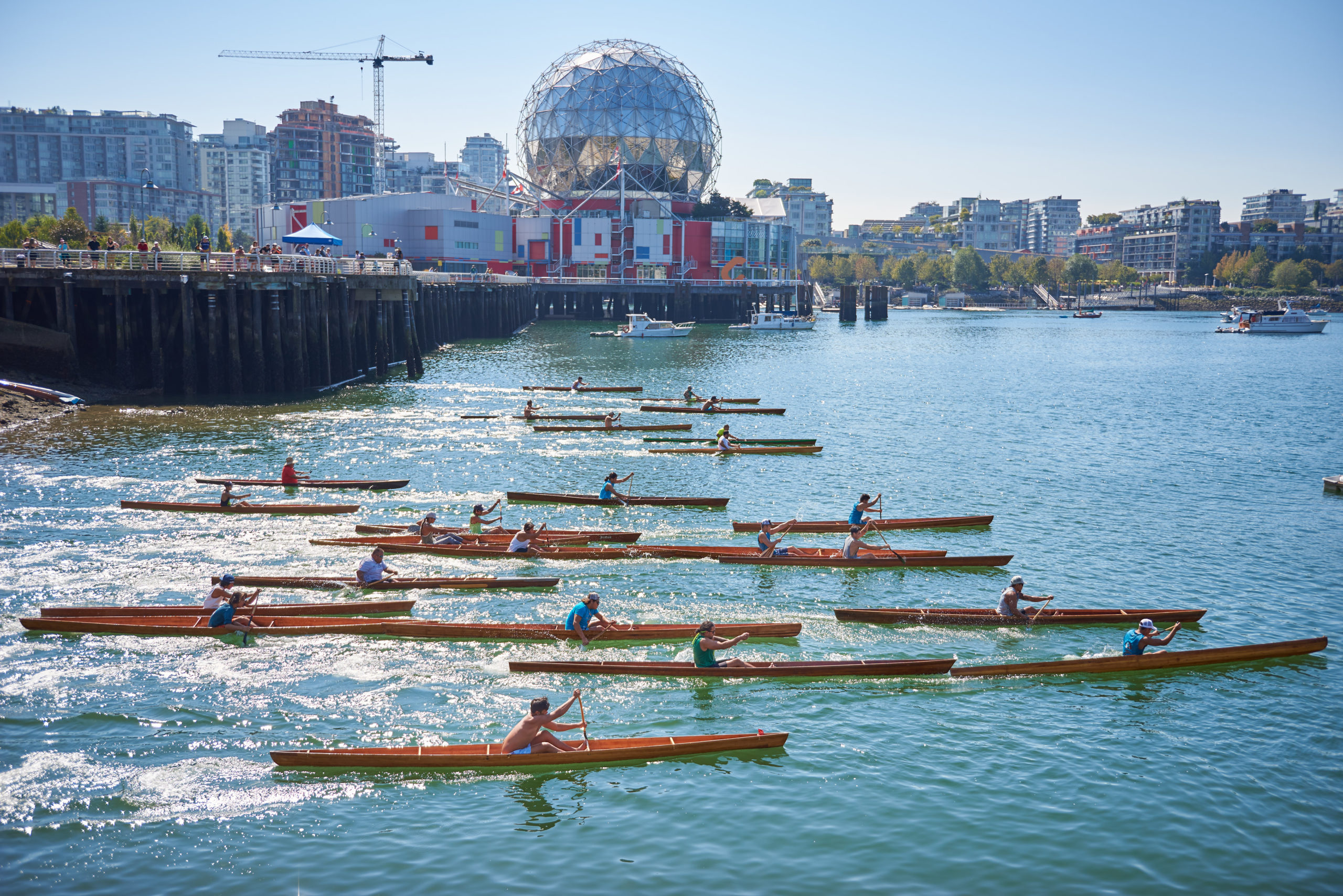 Canoe race with Science World in the background